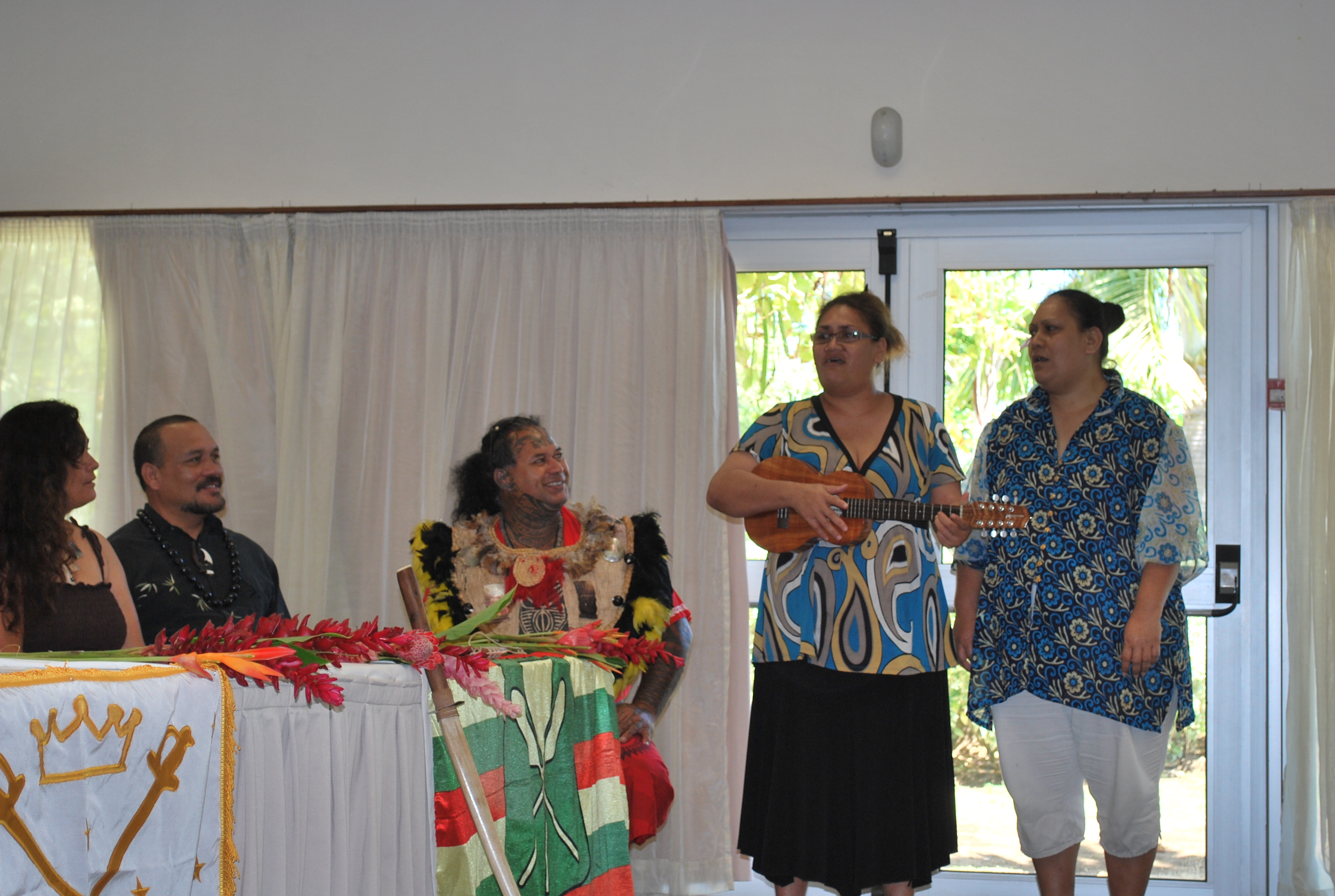 Tahitian sisters serenade the delegation with Hawaiian tunes